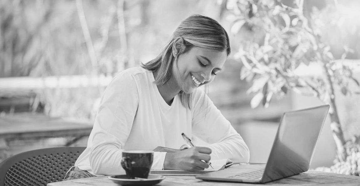 Financial planning workspace with documents and analysis materials