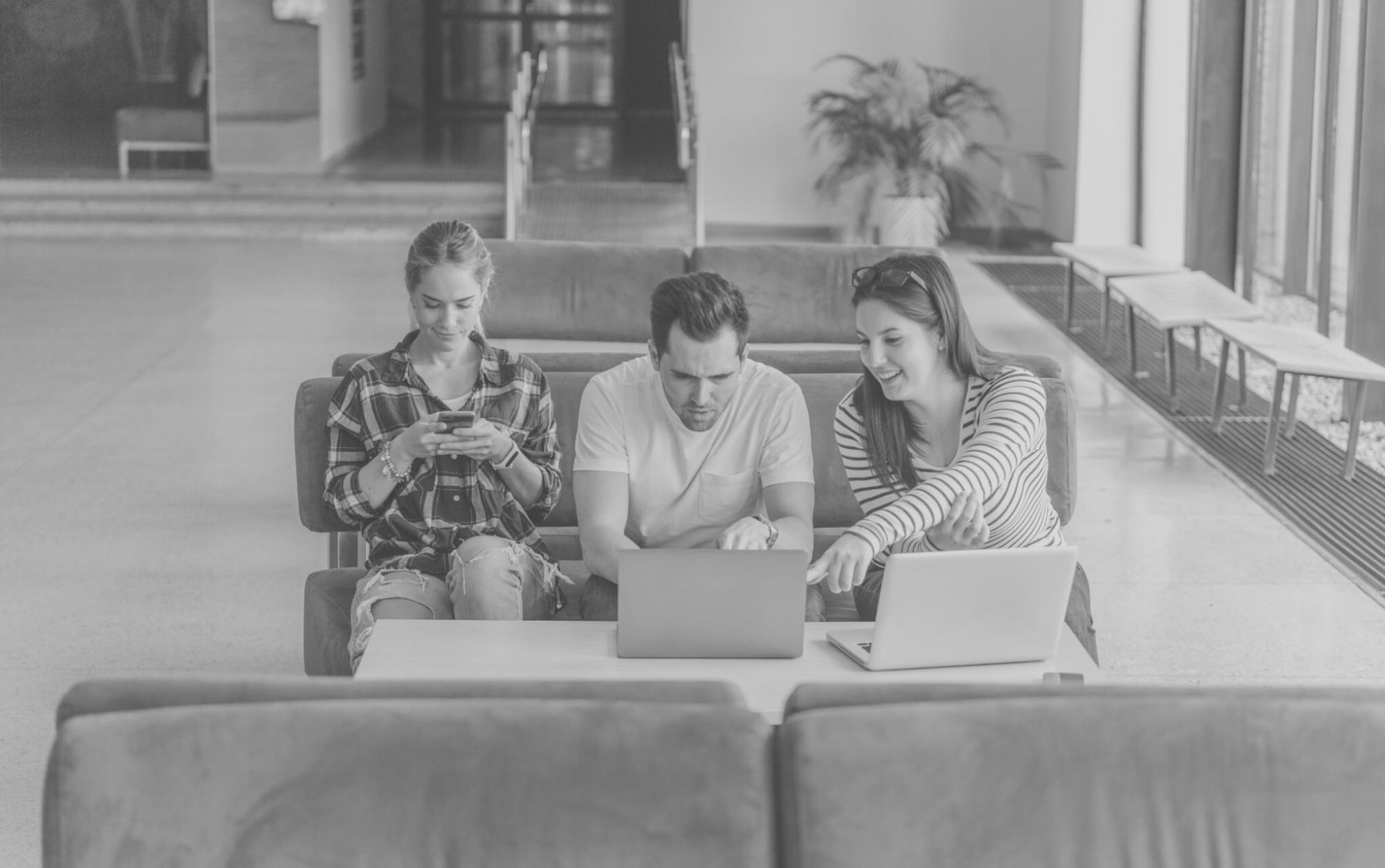 Professional workspace showing detailed financial projections and funding strategy documentation