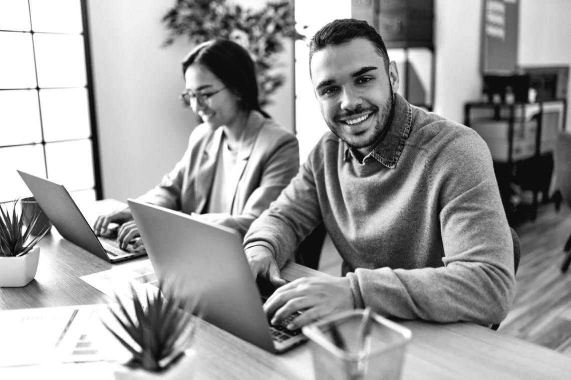 Professional workspace with financial charts and planning materials