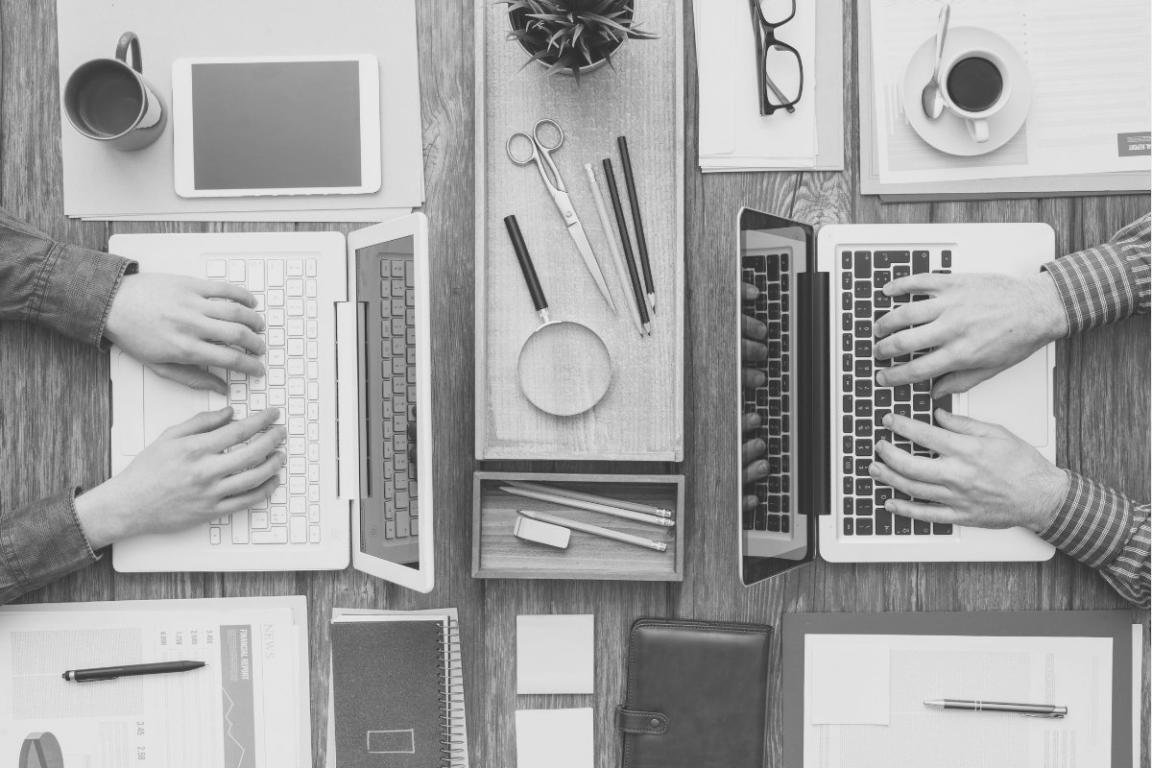 Financial analysis and project planning session with detailed documentation spread across workspace